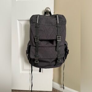 Grey multiple packets canvas unisex backpack